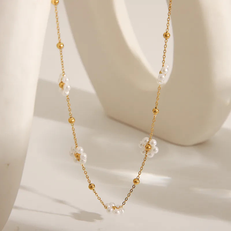 Filigrane Edelstahl Kette gold mit Blumen Details